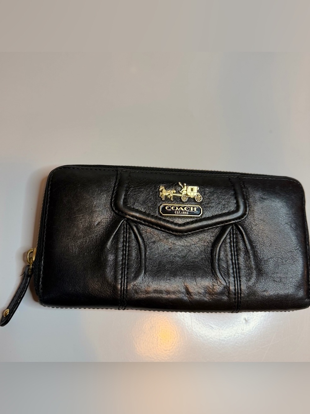 Coach Black Leather Zip-Around Wallet with Gold Coach Carriage Emblem Madison